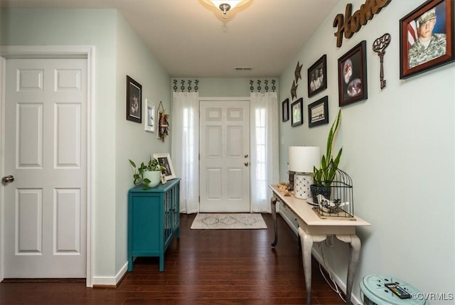 696 Anne Ln, Aylett, VA 23009 - foyer entrance with dark wood-style floors and baseboards