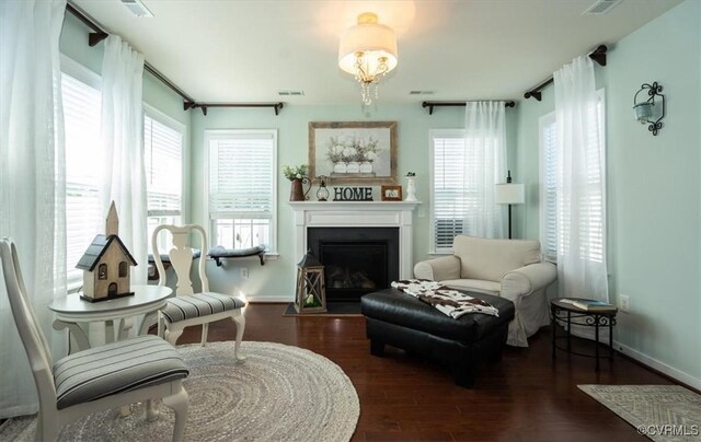 696 Anne Ln, Aylett, VA 23009 - sitting room featuring wood finished floors and a fireplace with flush hearth