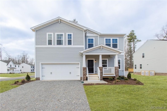 3417 Marwick Pl, Richmond, VA 23234 - view of front of house featuring an attached garage, covered porch, driveway, and a front yard