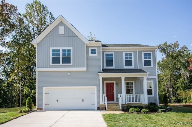 3417 Marwick Pl, Richmond, VA 23234 - view of front of house with a porch, an attached garage, driveway, and board and batten siding