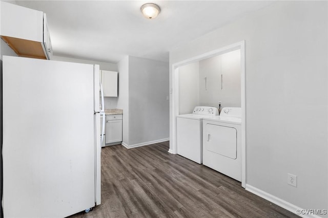 1110 Pine Ave, Hopewell, VA 23860 - laundry area with separate washer and dryer and dark wood-style flooring