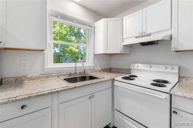 1110 Pine Ave, Hopewell, VA 23860 - kitchen featuring white electric range, under cabinet range hood, light countertops, and white cabinets