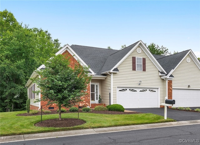 138 Carriage Point Ln, Glen Allen, VA 23059 - traditional-style home with driveway, a front yard, a garage, and roof with shingles
