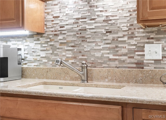 138 Carriage Point Ln, Glen Allen, VA 23059 - detailed view of decorative backsplash and a sink