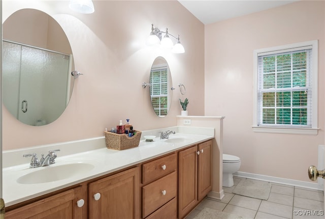 138 Carriage Point Ln, Glen Allen, VA 23059 - full bath featuring double vanity, tile patterned floors, and an enclosed shower