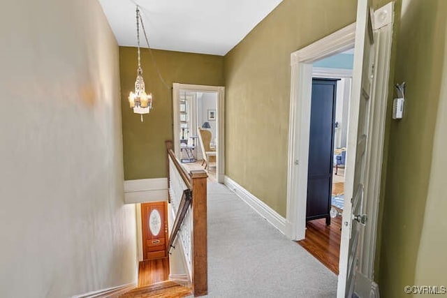 2024 Park Ave, Richmond, VA 23220 - corridor with a chandelier and an upstairs landing