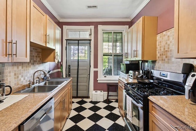 2024 Park Ave, Richmond, VA 23220 - kitchen featuring appliances with stainless steel finishes, light floors, light countertops, tasteful backsplash, and ornamental molding
