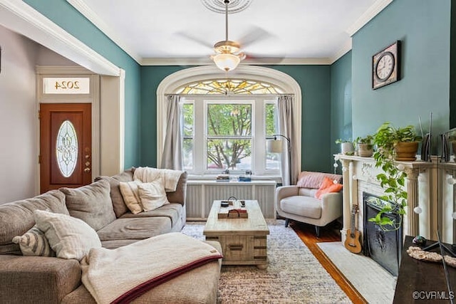 2024 Park Ave, Richmond, VA 23220 - living area featuring ceiling fan, wood finished floors, a fireplace, and crown molding