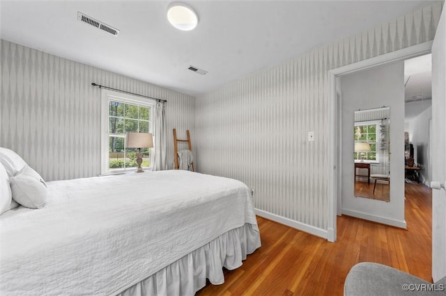 2226 Highland Dr, Powhatan, VA 23139 - bedroom with wood finished floors and wallpapered walls