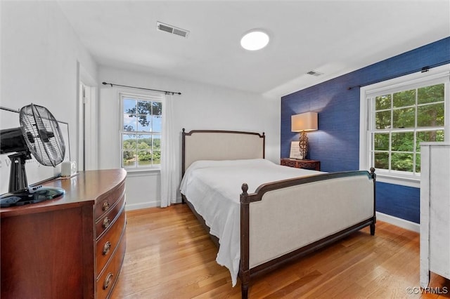 2226 Highland Dr, Powhatan, VA 23139 - bedroom with light wood-style flooring and multiple windows