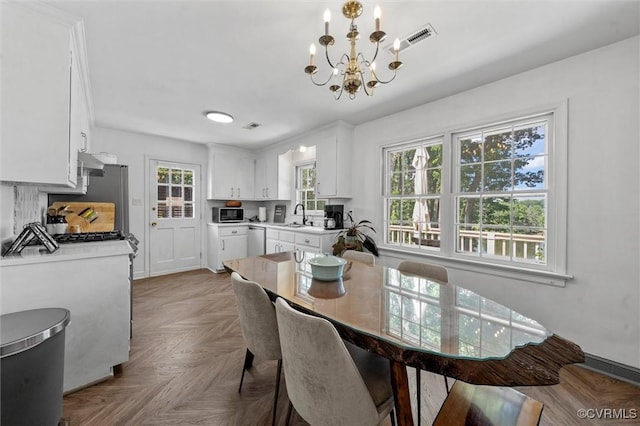 2226 Highland Dr, Powhatan, VA 23139 - dining space with plenty of natural light and a chandelier