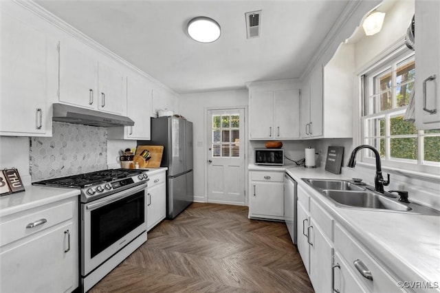 2226 Highland Dr, Powhatan, VA 23139 - kitchen with appliances with stainless steel finishes, under cabinet range hood, white cabinetry, and light countertops