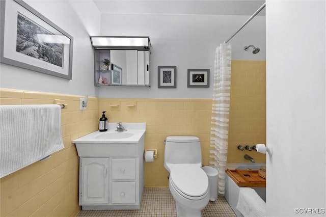 2226 Highland Dr, Powhatan, VA 23139 - bathroom with tile walls, vanity, tile patterned flooring, wainscoting, and shower / bath combo