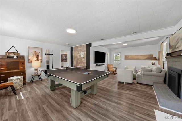 2226 Highland Dr, Powhatan, VA 23139 - playroom featuring wood finished floors and a brick fireplace
