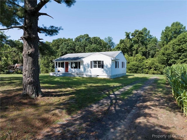 366 Patterson Rd, Mattaponi, VA 23110 - view of front of property featuring a front lawn, a porch, and a wooded view