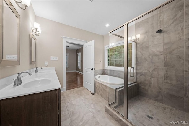 11499 Jack Ln, Hanover, VA 23146 - bathroom featuring double vanity, a stall shower, and a garden tub