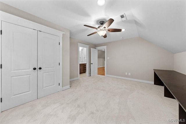 11499 Jack Ln, Hanover, VA 23146 - unfurnished bedroom featuring carpet, a closet, connected bathroom, lofted ceiling, and ceiling fan
