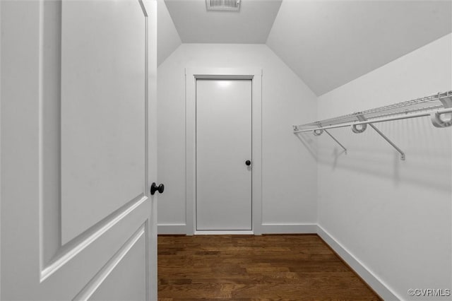 11499 Jack Ln, Hanover, VA 23146 - walk in closet with vaulted ceiling and dark wood finished floors