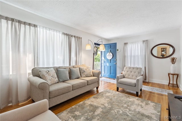 415 Crescent Ave, Colonial Heights, VA 23834 - living room featuring a textured ceiling and wood finished floors