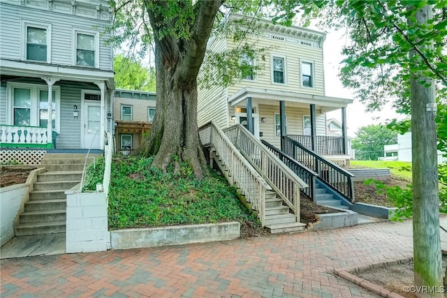 1410 W Clay St, Richmond, VA 23220 - view of front of property featuring a porch and stairway