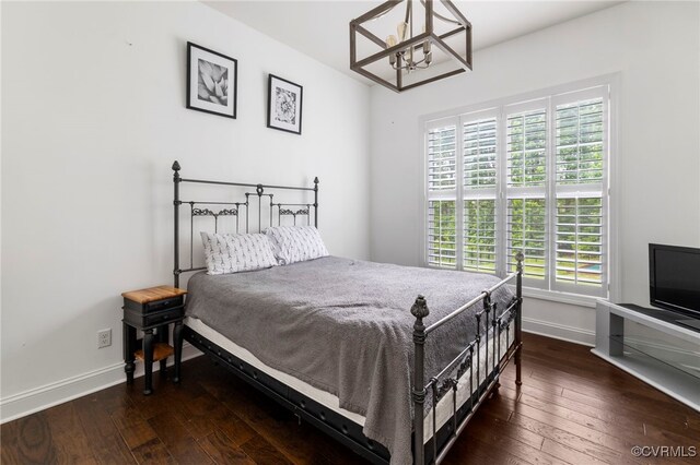 16507 Hannington Dr, Midlothian, VA 23112 - bedroom featuring a chandelier and dark wood-type flooring