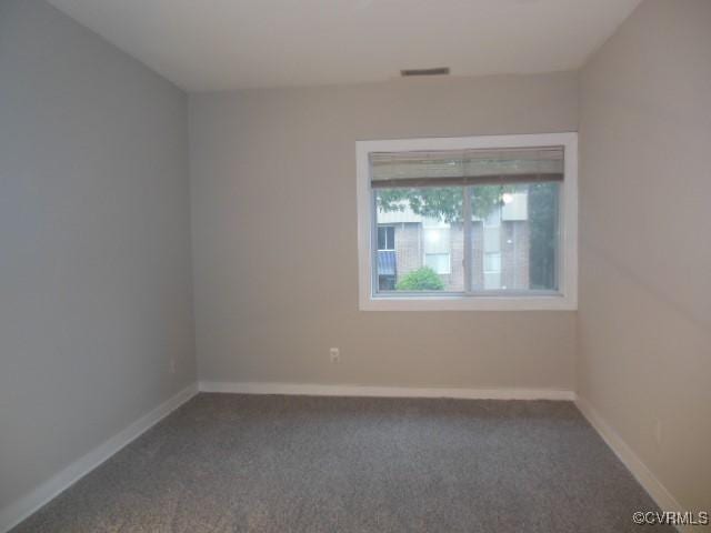 5220 Castlewood Rd Unit E, Chesterfield, VA 23234 - spare room with carpet floors and baseboards