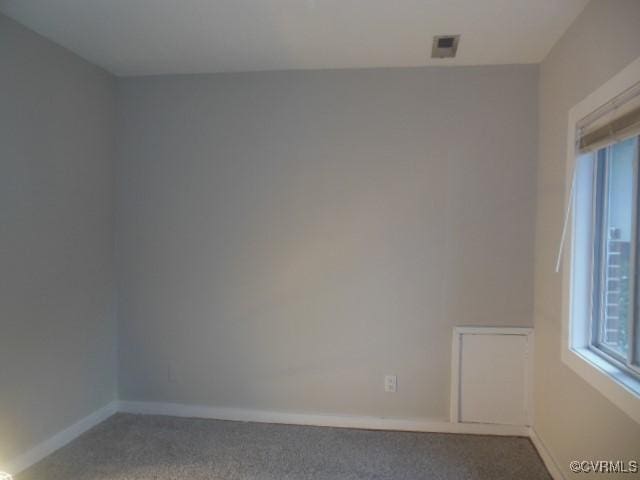 5220 Castlewood Rd Unit E, Chesterfield, VA 23234 - empty room with carpet flooring and plenty of natural light