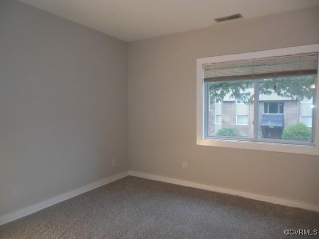 5220 Castlewood Rd Unit E, Chesterfield, VA 23234 - unfurnished room featuring dark carpet and baseboards