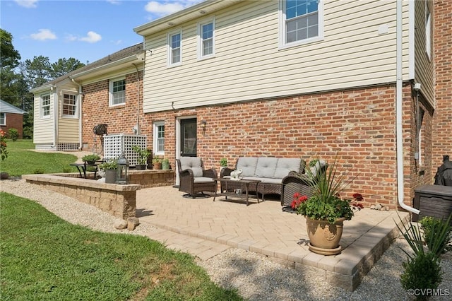4619 Otterdale Rd, Moseley, VA 23120 - rear view of property featuring outdoor lounge area, a patio area, and brick siding