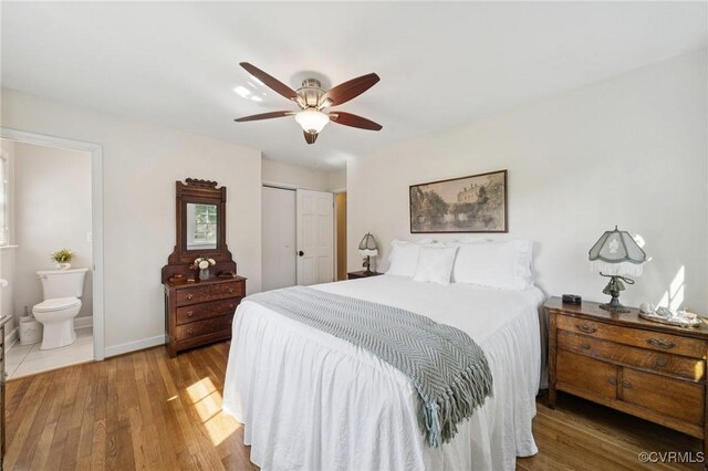 4619 Otterdale Rd, Moseley, VA 23120 - bedroom with a closet, wood finished floors, ensuite bathroom, and a ceiling fan