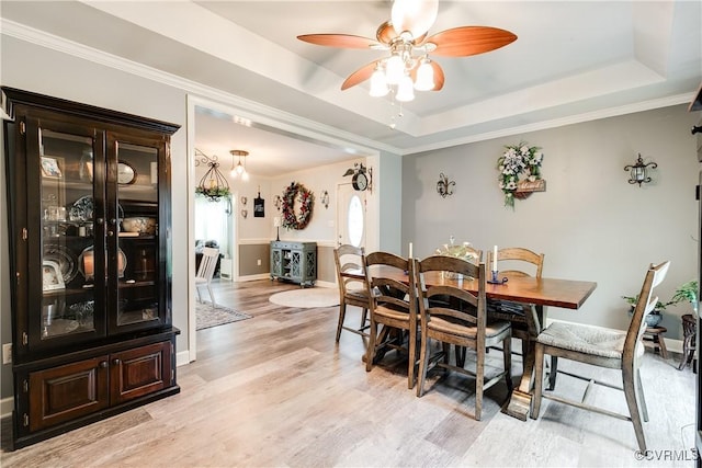 698 Quail Crossing Rd, Burkeville, VA 23922 - dining room with a raised ceiling, light wood finished floors, ceiling fan, and ornamental molding