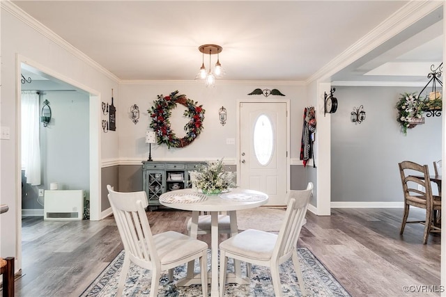 698 Quail Crossing Rd, Burkeville, VA 23922 - dining area with wood finished floors and crown molding