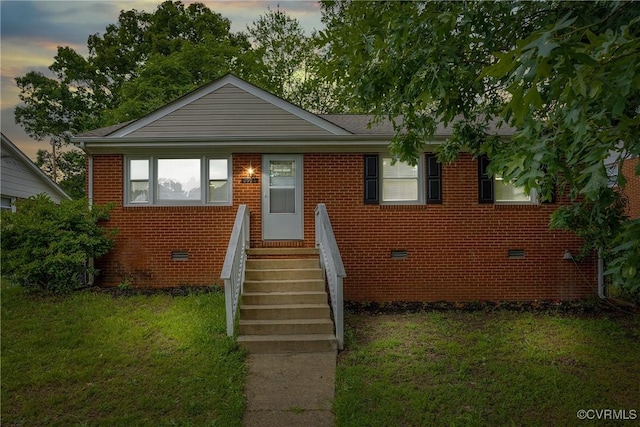 2924 Glenan Dr, Richmond, VA 23234 - bungalow featuring a front lawn, crawl space, and brick siding