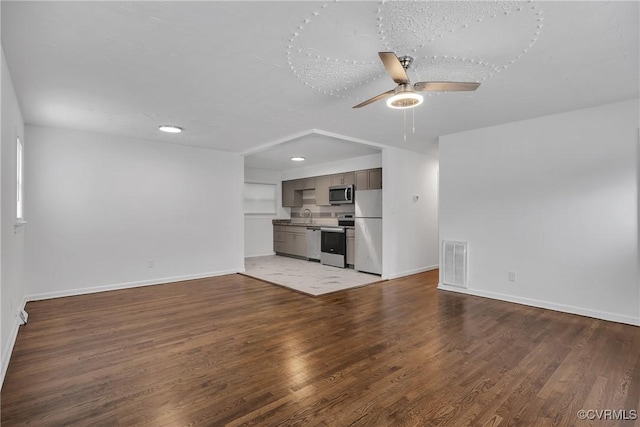 2924 Glenan Dr, Richmond, VA 23234 - unfurnished living room featuring a ceiling fan, light wood-style floors, and recessed lighting