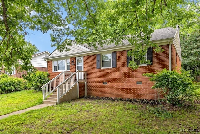 2924 Glenan Dr, Richmond, VA 23234 - view of front of property with a front lawn, brick siding, and crawl space