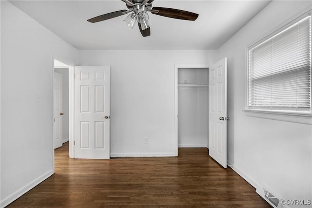 2924 Glenan Dr, Richmond, VA 23234 - unfurnished bedroom with dark wood finished floors, a closet, and ceiling fan