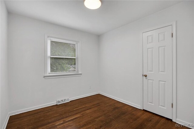 2924 Glenan Dr, Richmond, VA 23234 - unfurnished room with dark wood-type flooring and baseboards