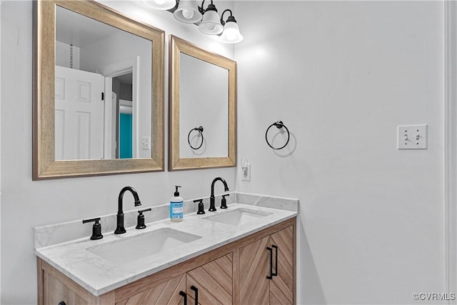 5019 Misty Spring Dr, Midlothian, VA 23112 - bathroom featuring double vanity and a chandelier