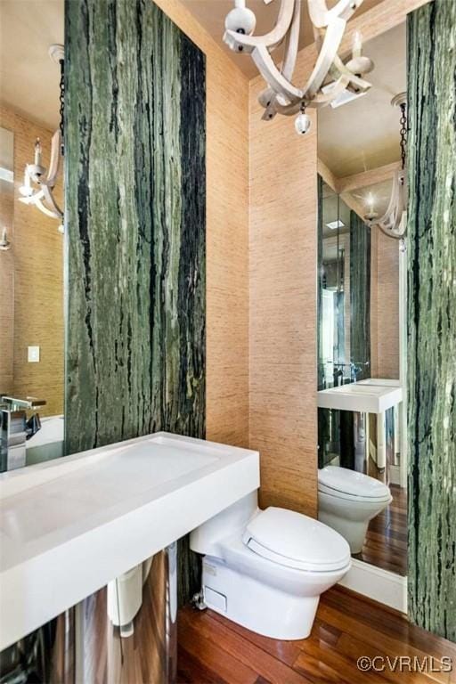 10333 Sonny Meadows Ln, Hanover, VA 23116 - bathroom featuring a chandelier and wood finished floors
