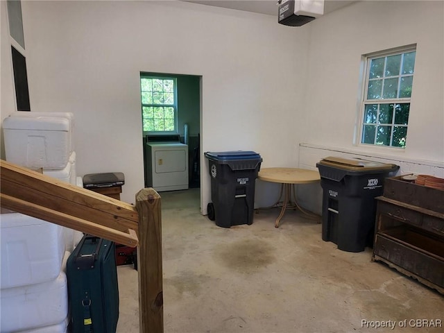 122 Longhill Rd, Williamsburg, VA 23185 - bedroom with washer / dryer and concrete flooring