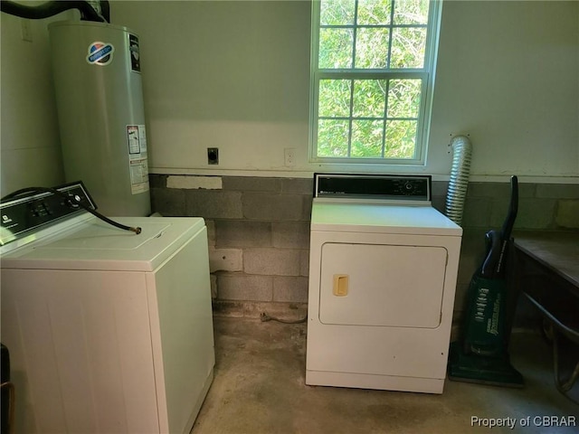 122 Longhill Rd, Williamsburg, VA 23185 - laundry area with water heater, independent washer and dryer, and concrete block wall