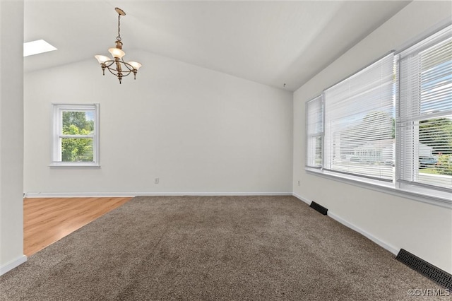 7470 Old Grove Gln, Mechanicsville, VA 23111 - unfurnished room featuring carpet flooring, plenty of natural light, a chandelier, and vaulted ceiling