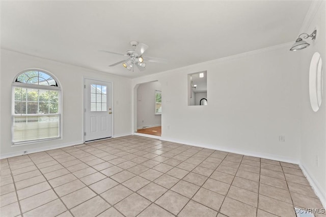 7470 Old Grove Gln, Mechanicsville, VA 23111 - foyer entrance with crown molding, ceiling fan, light tile patterned floors, and arched walkways