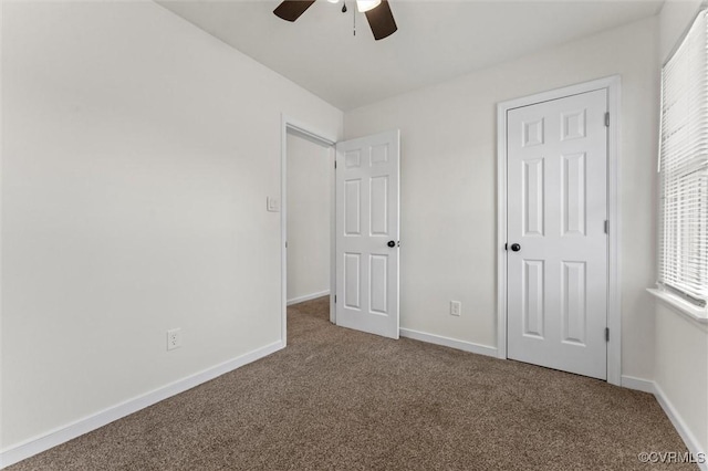7470 Old Grove Gln, Mechanicsville, VA 23111 - unfurnished bedroom with carpet, multiple windows, and ceiling fan