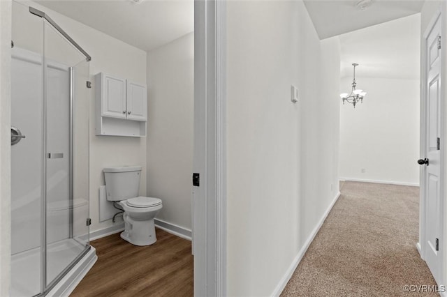 7470 Old Grove Gln, Mechanicsville, VA 23111 - full bathroom with a stall shower and a chandelier