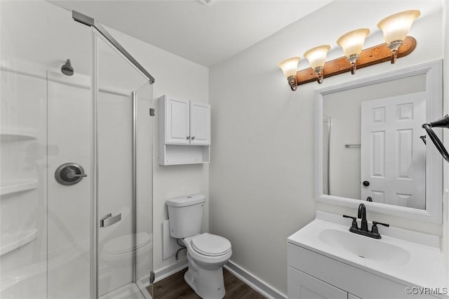 7470 Old Grove Gln, Mechanicsville, VA 23111 - bathroom with vanity, wood finished floors, and a stall shower
