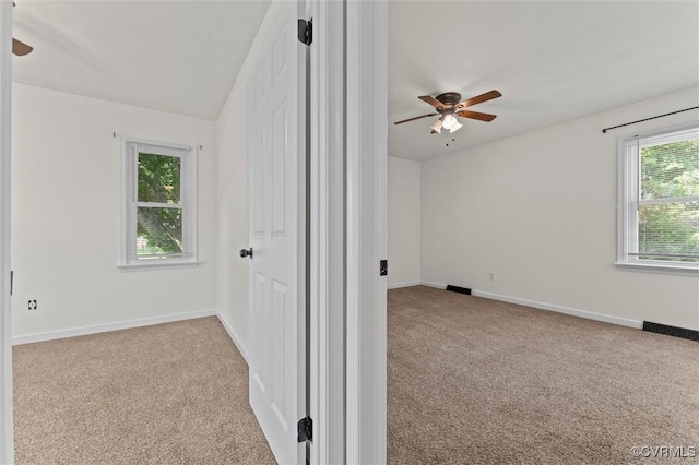 7470 Old Grove Gln, Mechanicsville, VA 23111 - carpeted spare room with a ceiling fan and baseboards
