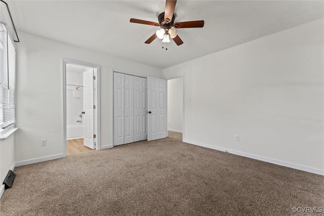 7470 Old Grove Gln, Mechanicsville, VA 23111 - unfurnished bedroom featuring carpet, connected bathroom, a closet, and ceiling fan