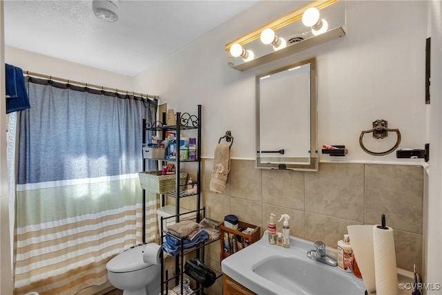 1007 Bolton Rd, Richmond, VA 23225 - bathroom with tile walls and a shower with curtain