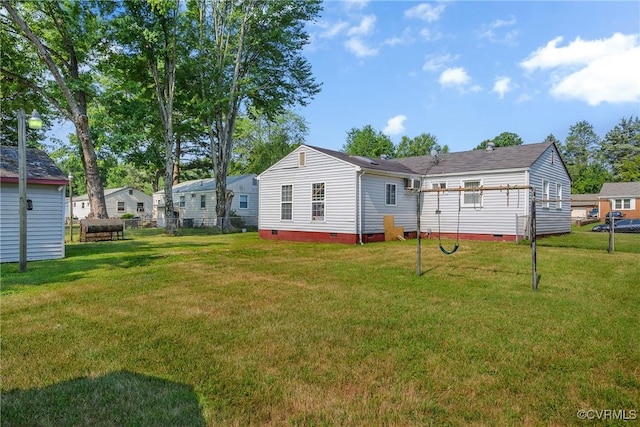 1007 Bolton Rd, Richmond, VA 23225 - rear view of property with crawl space and a yard